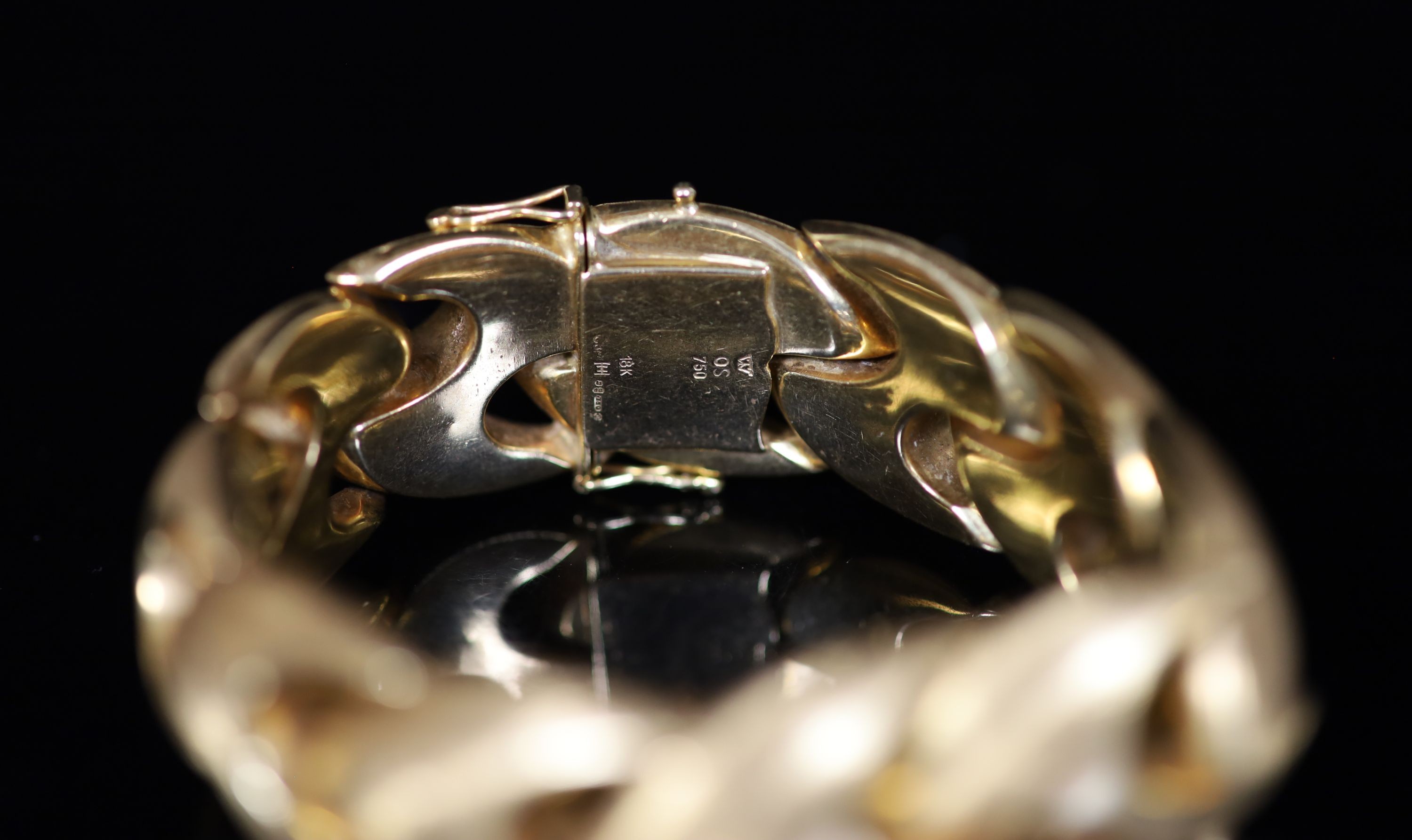 A 1970's brushed 18ct gold bracelet, 18.5cm, 57.3 grams.